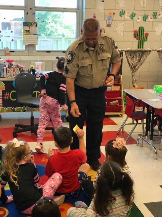 Sgt. Eric Eilers of the Community Relations Division was asked to go read at Ms.