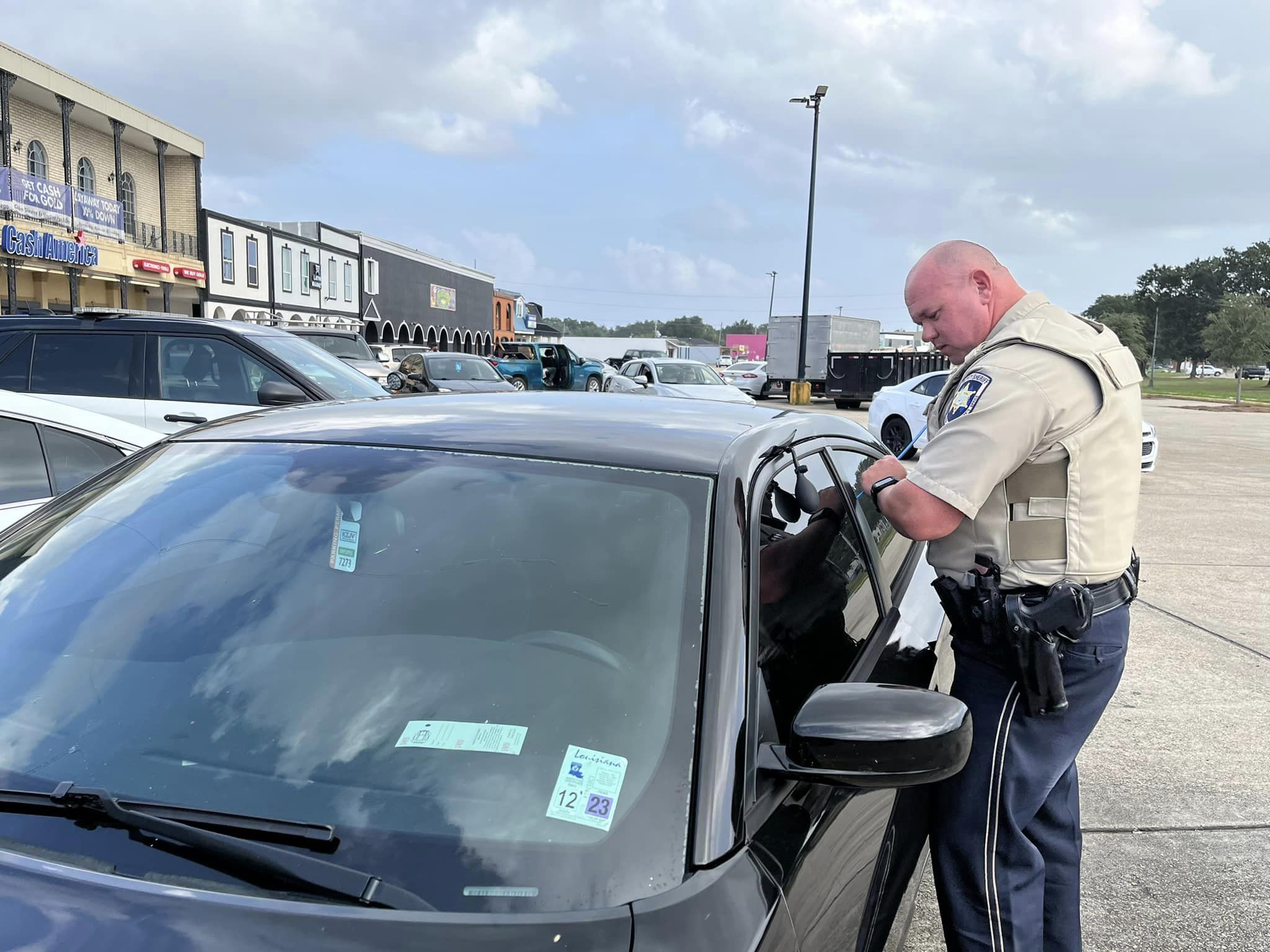 SBSO to the rescue SBSO Traffic Division Dep. Robert Smith helps a motorist unlock their vehicle